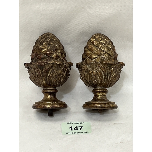 A pair of late 19th century gilt bronze pineapple finials. 4in high