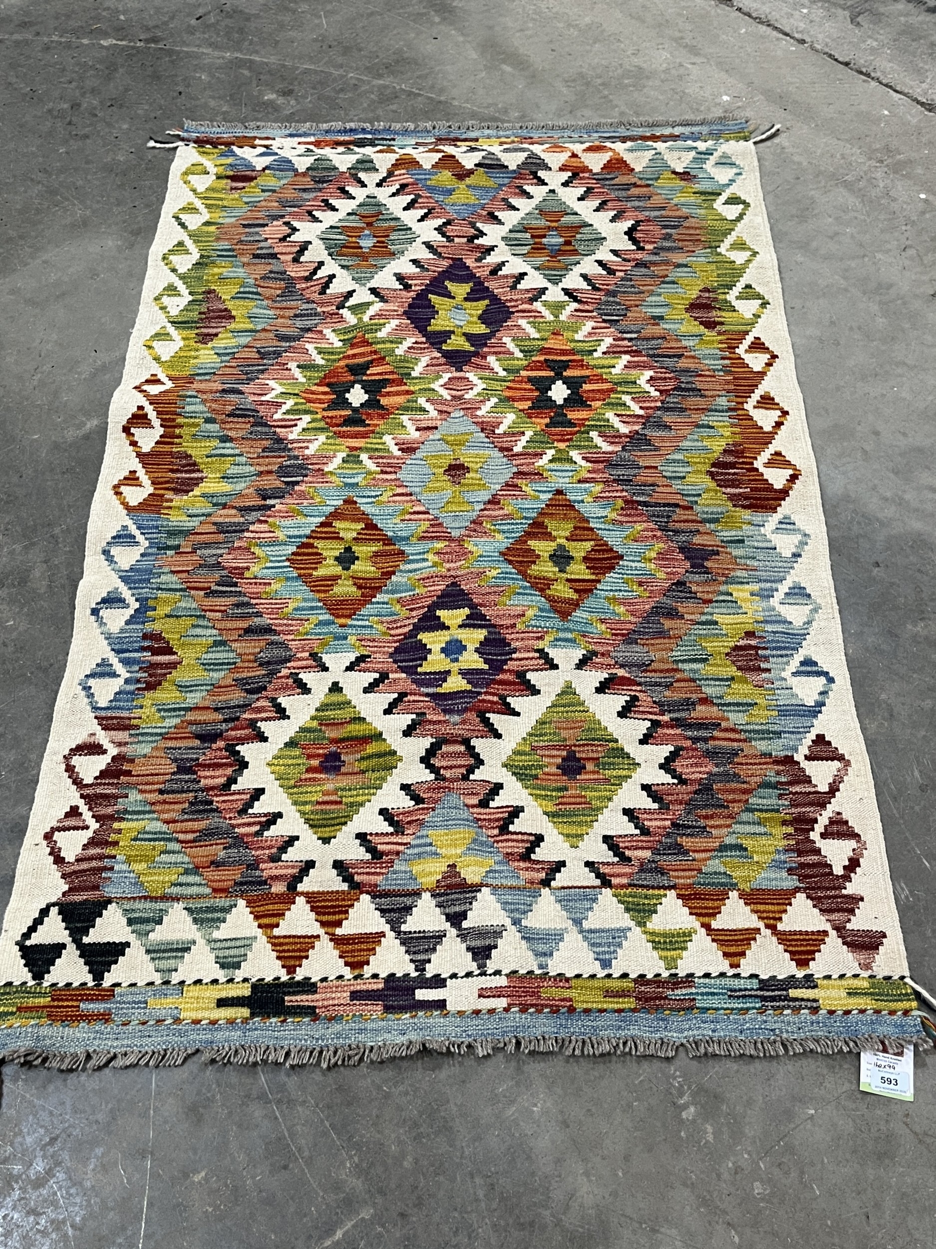 A Chobi Kilim rug. 1.6m x 0.99m