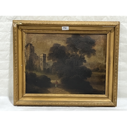 102 - ENGLISH SCHOOL. 19TH CENTURY  Castle ruins with figure on a path. Oil on board 14in x 18in