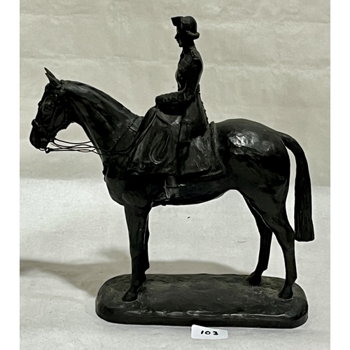 103 - A bronzed resinous group of Queen Elizabeth II on horseback. 13in high