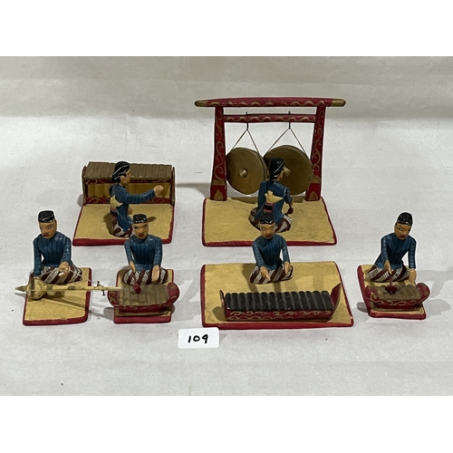 109 - A group of Indonesian polychrome painted wood Gamelan musician figures