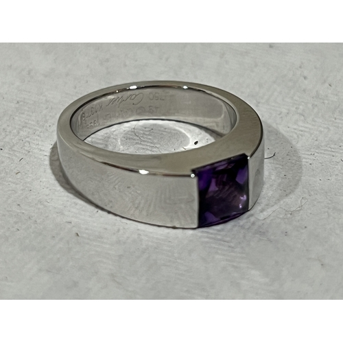 190 - An 18ct Cartier white gold amethyst ring. 9.58g gross. Size J. Boxed with paperwork
