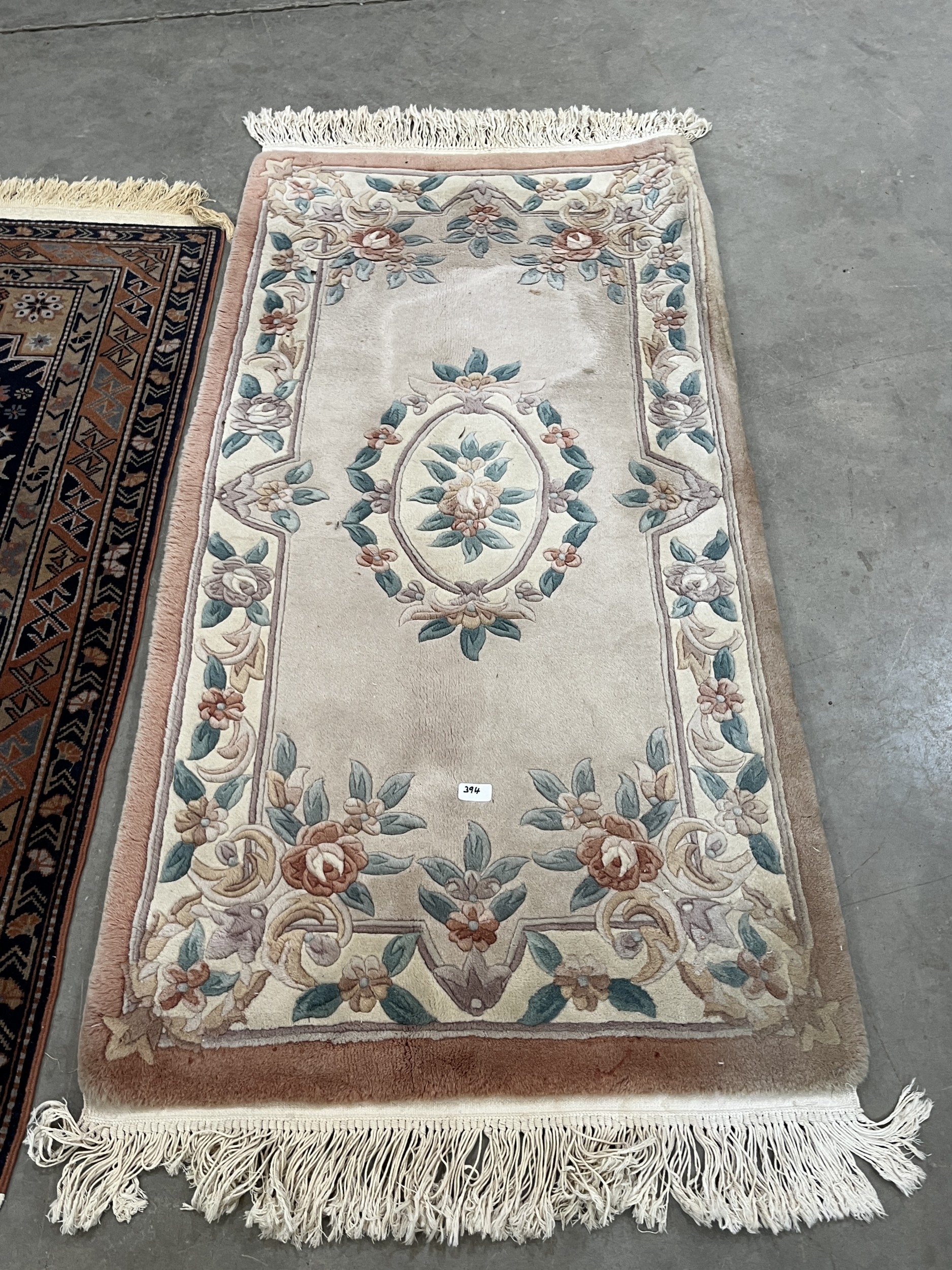 A Middle-eastern rug, 59in x 39in