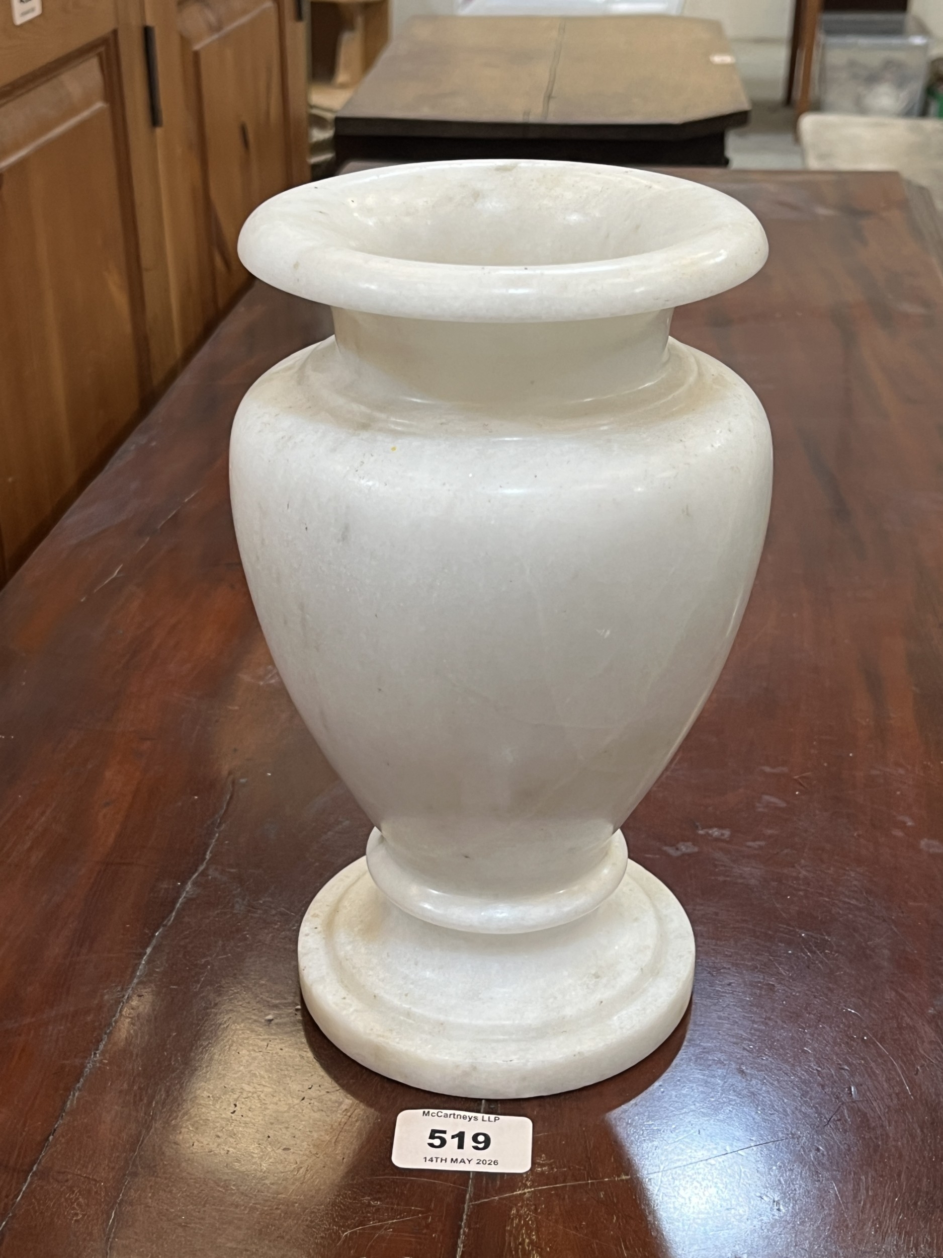 A Carrara marble inverted baluster vase. 9½in high