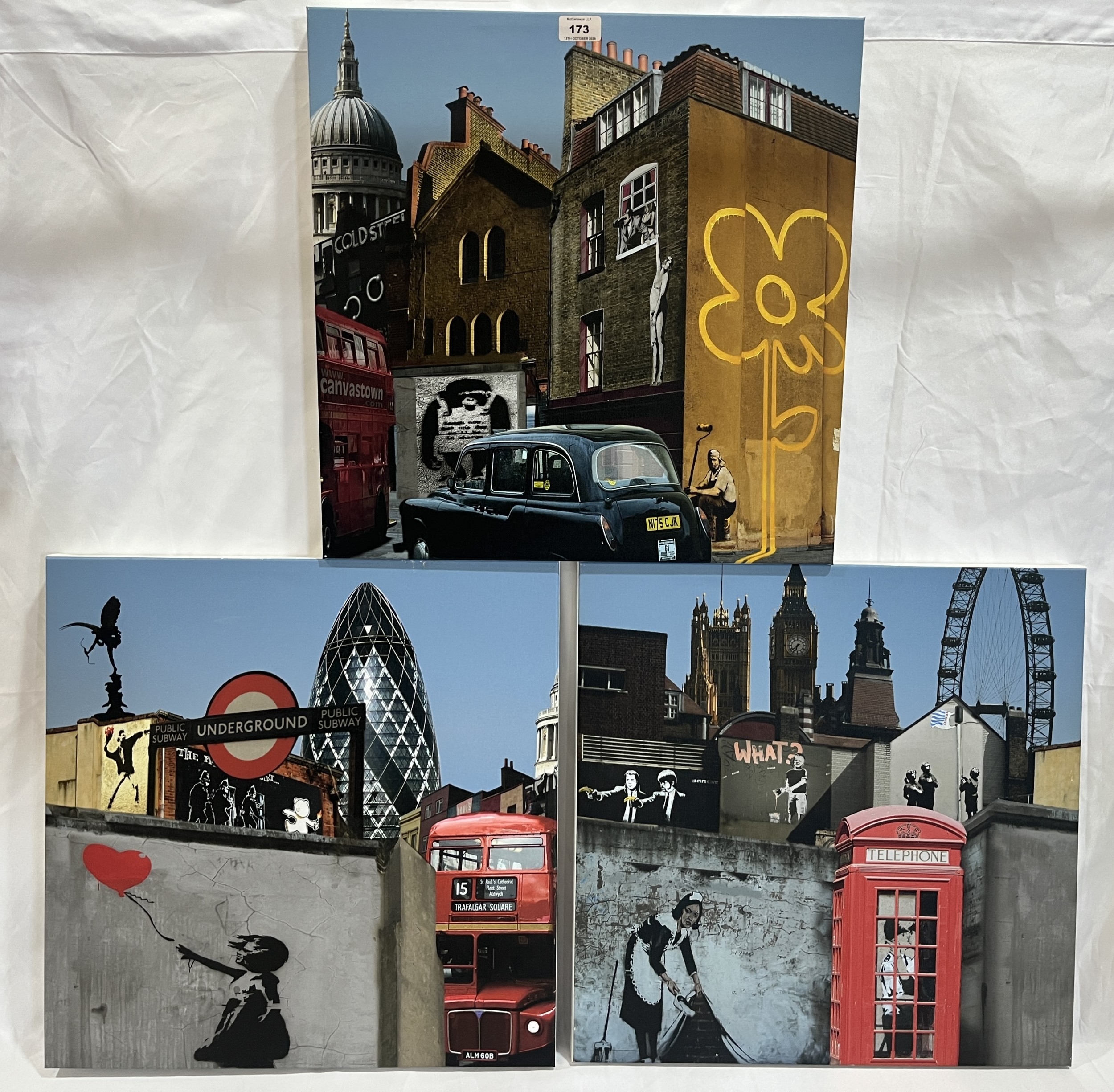 A set of three reproduction canvas prints inspired by Banksy. 20in x 20in