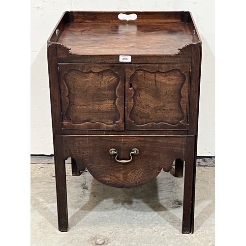 A George III mahogany tray top commode or night cupboard. 20in wide