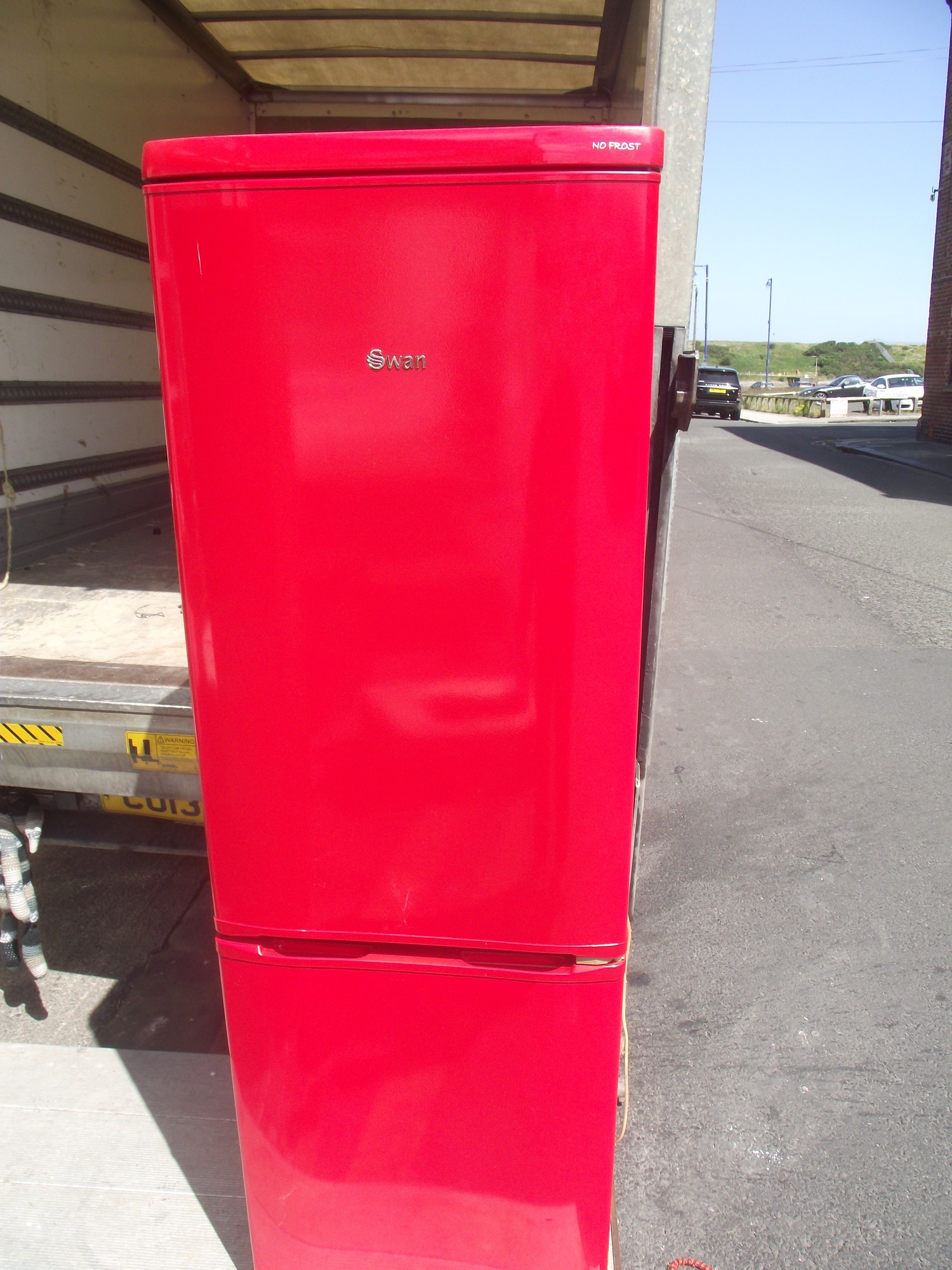 Swan red outlet fridge freezer