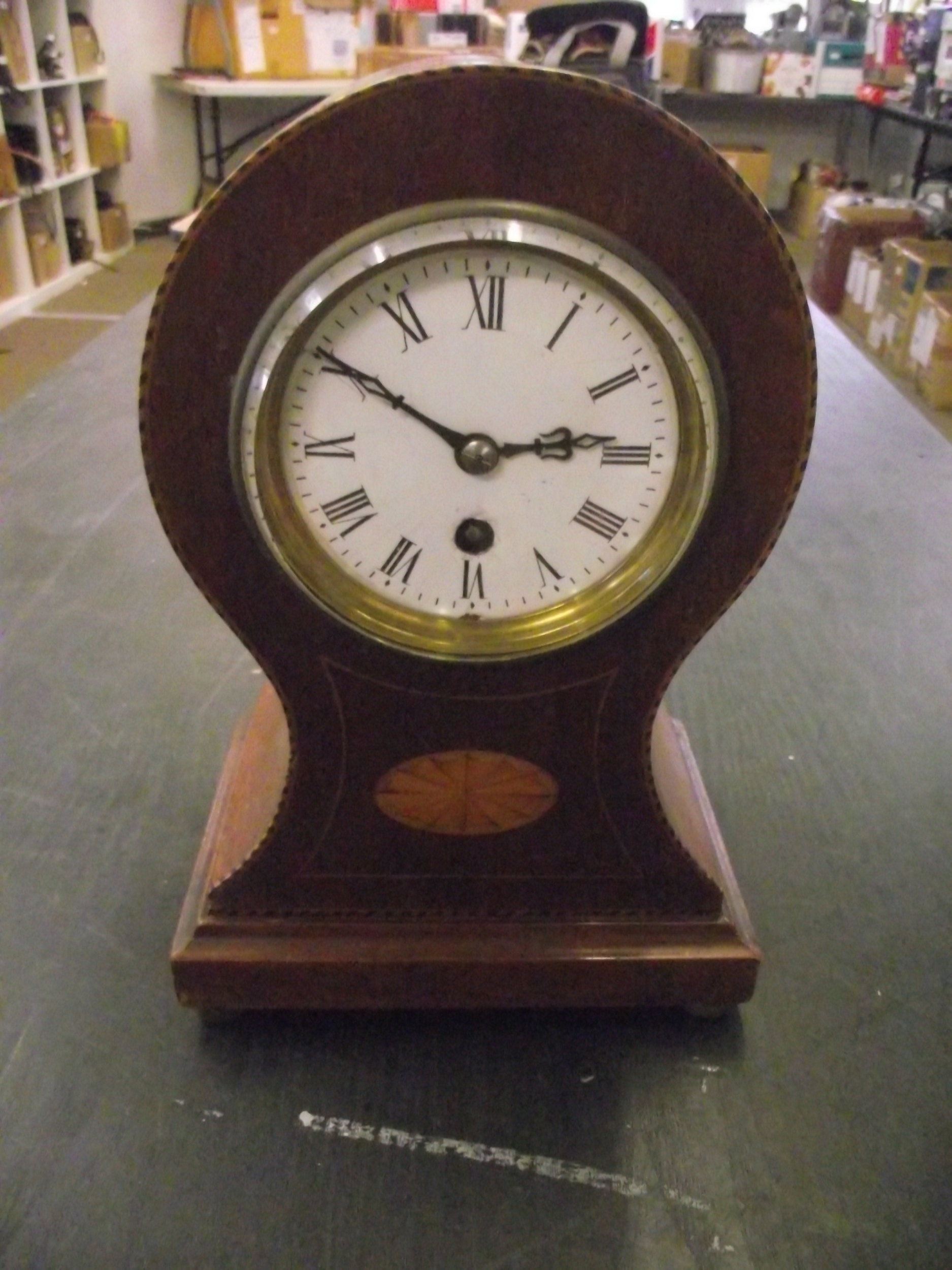 Keyhole shaped vintage mantle clock.