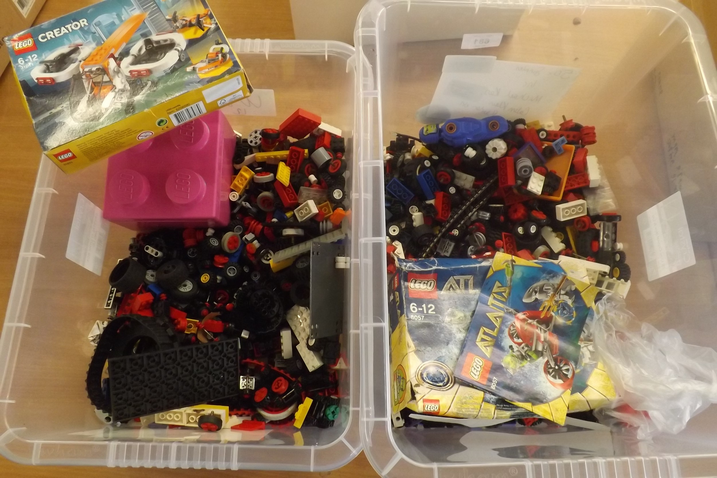 2 boxes of Lego pices + unopened kit.