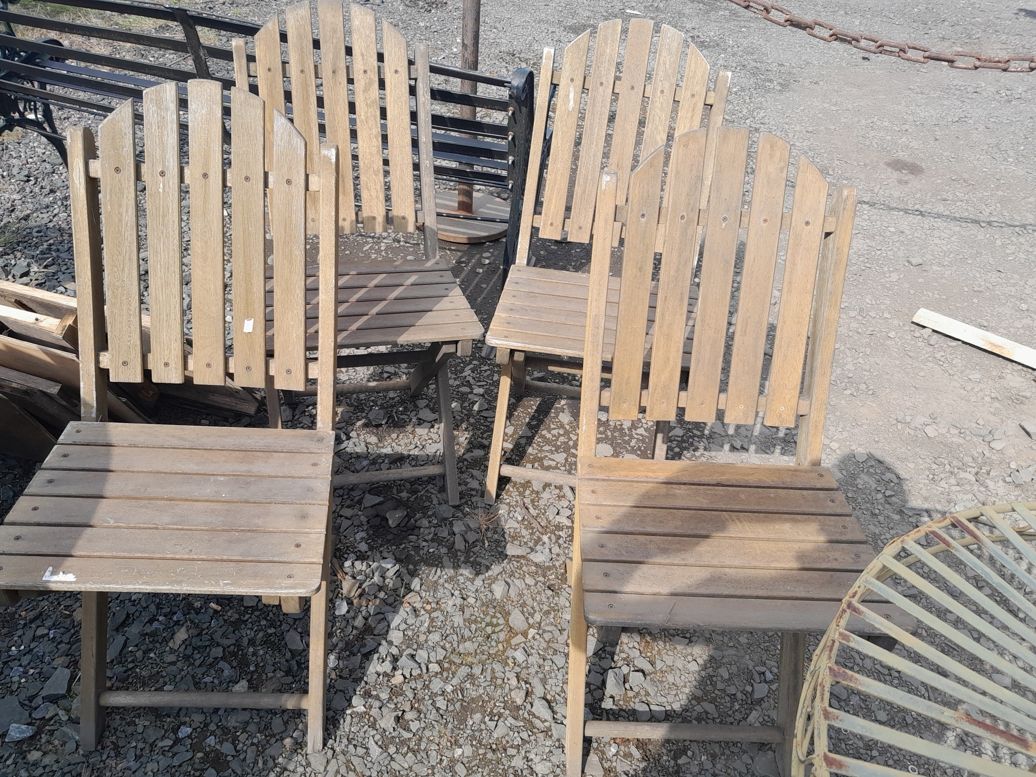 4 x wooden rustic garden chairs Item available for collection or