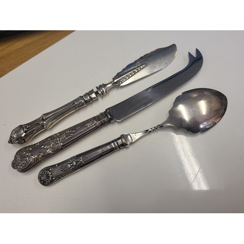 9 - 3 Silver handle cutlery items
