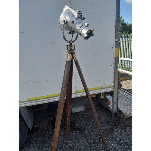33 - Antique wood and brass theodolite tripod fitted with 1930s fully working theatre light appro 6ft 6 a... 