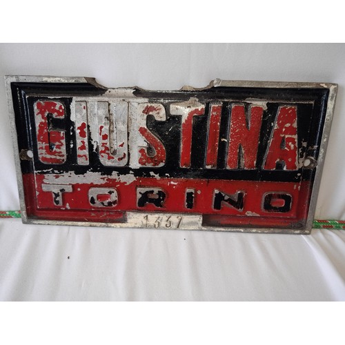 49 - Vintage Cast Iron Turino sign size 10 inches.