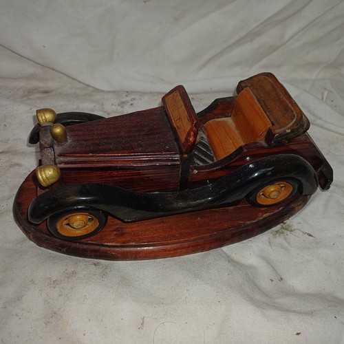 24 - .Large wooden sports car