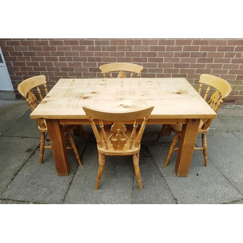6 - Solid Plank Top Farmhouse Pine Table with Four  Farmhouse Pine Chairs measuring 60 inches x 36 inche... 