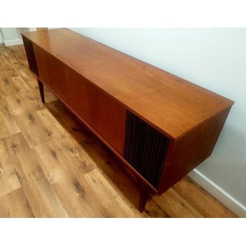 46 - Dynatron Teak Stereo Radiogram with lift up lid and Garrard Turntable, measuring 184cm in length.  W... 
