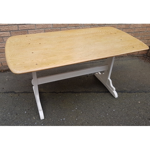 72 - A rectangular refectory Ercol dining table with painted base.  Top size is 54 inches x 28 inches