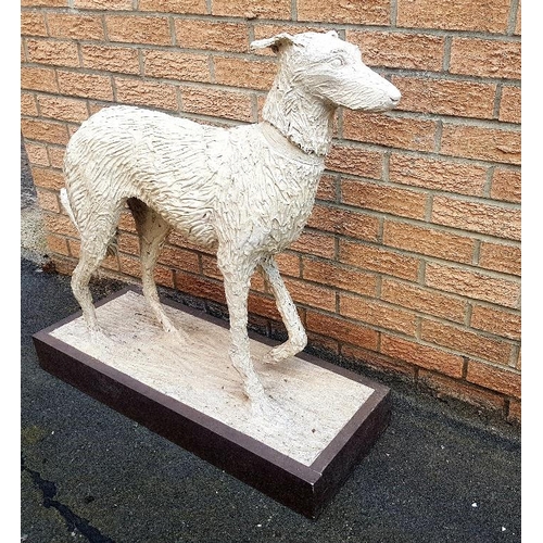 44 - Lifesize realistic Ceramic Sculpture of a Lurcher dog on a wooden plinth, measuring 87cm in height x... 