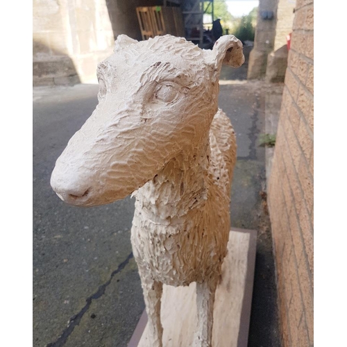 44 - Lifesize realistic Ceramic Sculpture of a Lurcher dog on a wooden plinth, measuring 87cm in height x... 