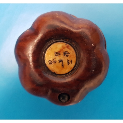 53 - A small foldaway compass in a Chinese Design with carved bone inlay in wood