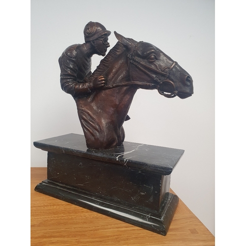54 - Large Contemporary Racehorse Figure with Jockey mounted on Black Marble Base.  Size is 12 inches len... 