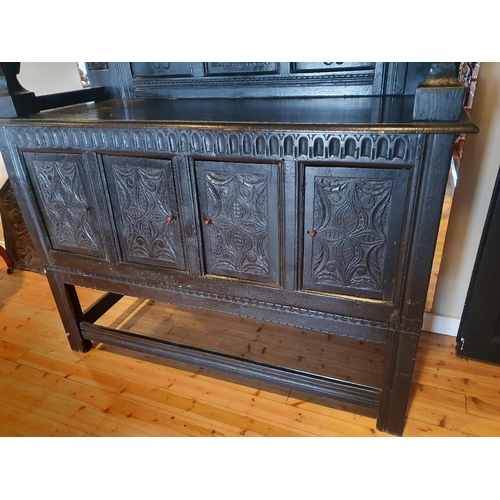 42 - Handsome 17th/18th Century Oak Court Cupboard with carved panels and frieze supported by baluster tu... 