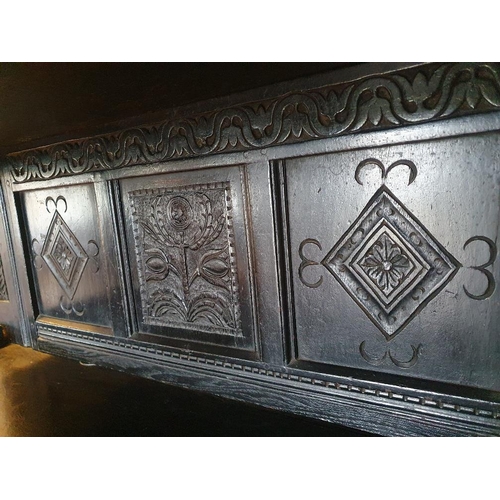 42 - Handsome 17th/18th Century Oak Court Cupboard with carved panels and frieze supported by baluster tu... 