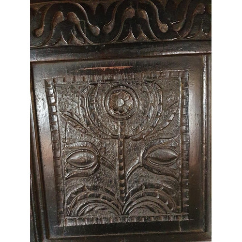 42 - Handsome 17th/18th Century Oak Court Cupboard with carved panels and frieze supported by baluster tu... 