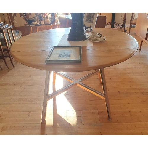 44 - Ercol Oval Drop Leaf Dining Table, Product Number 377.   Extended size is 48 inches x 44 inches.