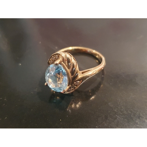 16 - 9ct Gold Ring Set with large Topaz, total weight 3.73g