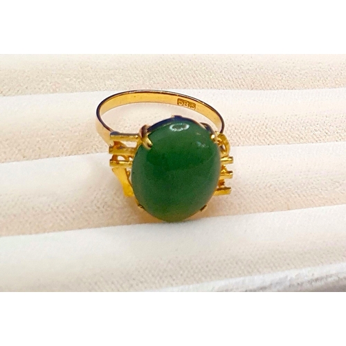 23 - 14ct Gold Jade Ring.  Gross weight 3.79g, size L