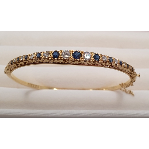 26 - Stunning 18ct Gold Sapphire and Diamond Bangle, weight 15.33g