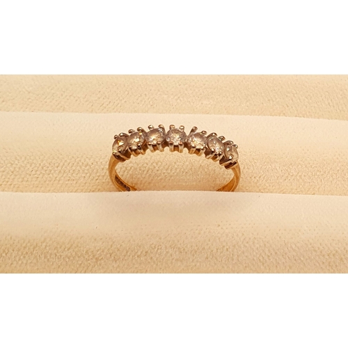 8 - 9ct Gold Ring set with 7 small diamonds, weight 1.31g, Size M