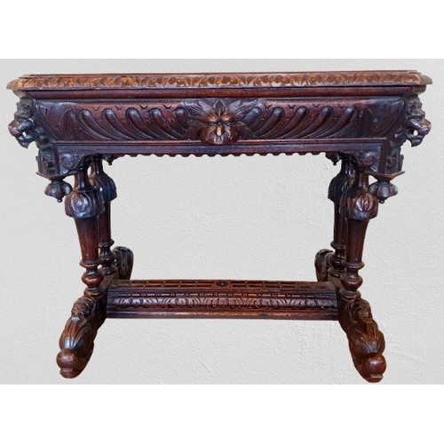 1 - Ornate heavily carved oak Jacobean Revival Library Table with long disguised drawer to the front wit... 