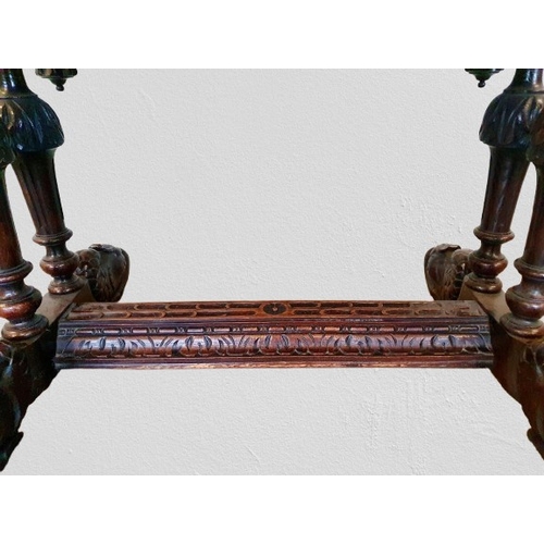 1 - Ornate heavily carved oak Jacobean Revival Library Table with long disguised drawer to the front wit... 