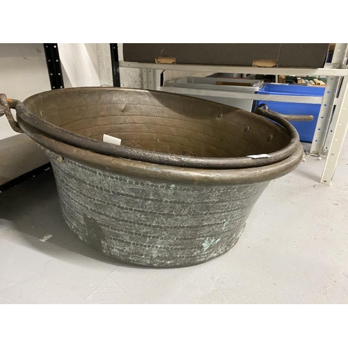 26 - 19th cent. Circular brass large cooking pot, dia. 25ins. with iron handle 26ins.