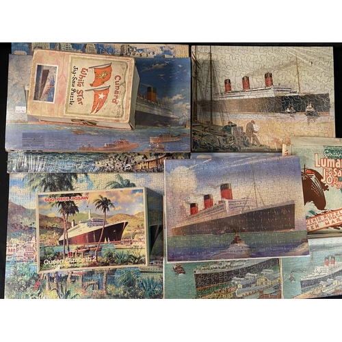 70 - OCEAN LINER: Chad Valley and other jigsaws showing Queen Mary, Queen Elizabeth II, etc. (9).