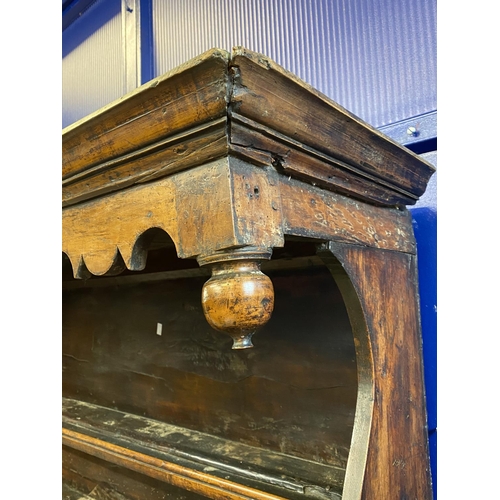 125 - 18th cent. Welsh oak dresser with ornate fruit wood frieze to shelves. Base with two long drawers an... 