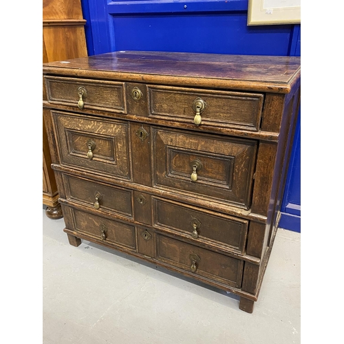 127 - 18th cent. English oak geometric chest of four drawers. Four moulded drawers with brass pear drop ha... 