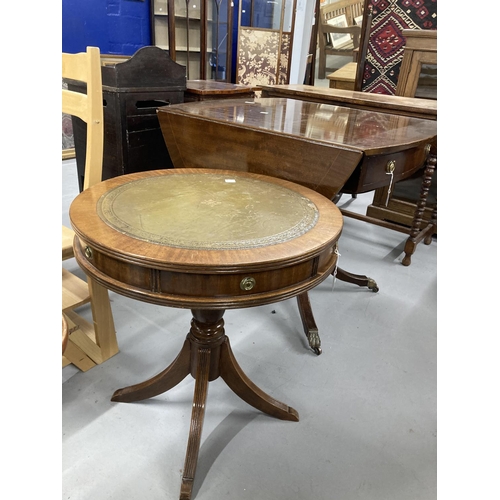 34 - 20th cent. Mahogany oval drop leaf table, two drawers beneath and quad supports with brass terminals... 