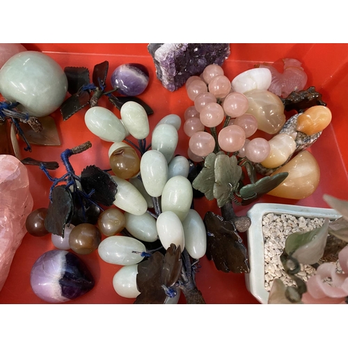 372 - Oriental Carved Minerals: Rock crystal, jadeite, quartz, amethyst, bunches of grapes x 2, plum, appl... 