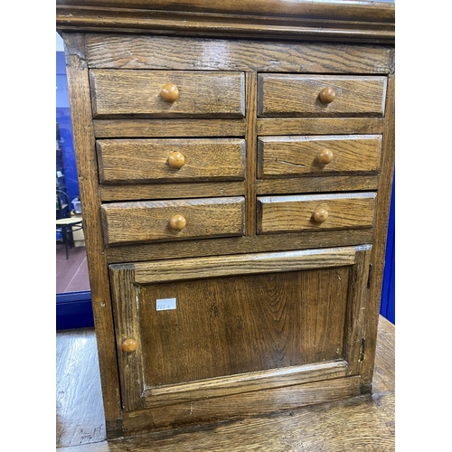 46 - Rustic oak Ecuadorian oak two tier kitchen with spice drawers. 32ins. x 63ins.