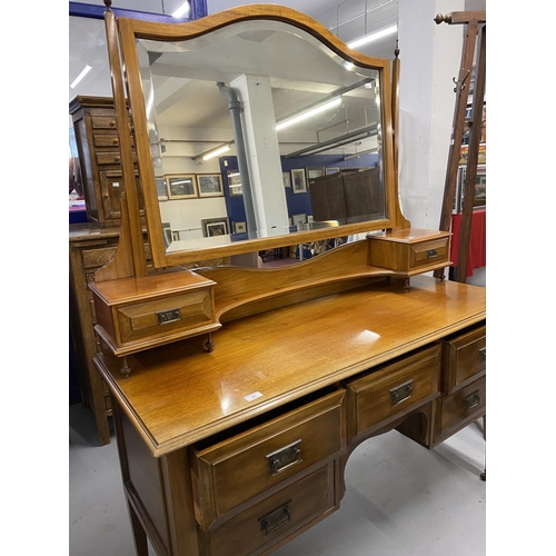 47 - 20th cent. Mahogany dressing table on tapering supports. 53ins. x  67ins. x 20ins.