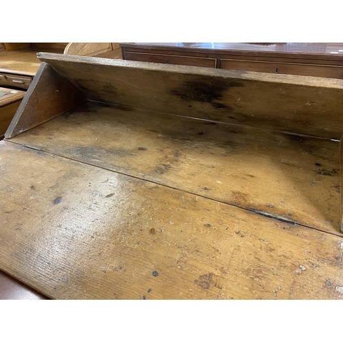 95 - Late 19th cent. Pitch pine tack room table, the folding triangular top opening to form a work table ... 