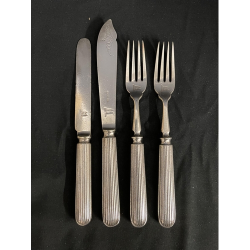 174 - WHITE STAR LINE: First-Class Elkington plate knives and forks with reeded handles. (4)