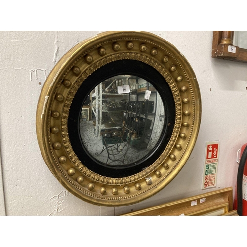 36 - Mirrors: 19th cent. Gilt framed circular convex mirror. 20ins. Dia.