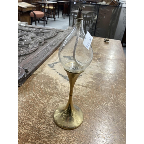 25 - Metalware: Brass and pewter assorted lamps includes a Freddie Anderson clear drop, and an early 20th... 