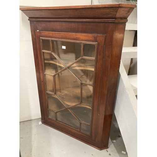 40 - 19th cent. Glazed mahogany corner cabinet. 30ins. x 17ins. x 38ins.