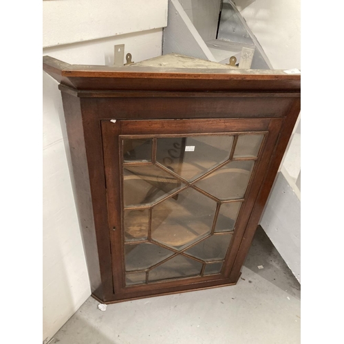 40 - 19th cent. Glazed mahogany corner cabinet. 30ins. x 17ins. x 38ins.