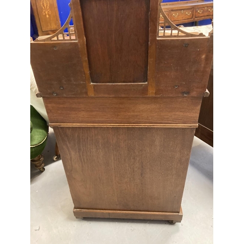 100 - Edwardian mahogany davenport with raised super structure, central mirror flanked by two small drawer... 